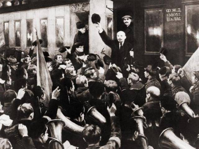 Lenin returns from exile and arrives in Petrograd via a sealed train