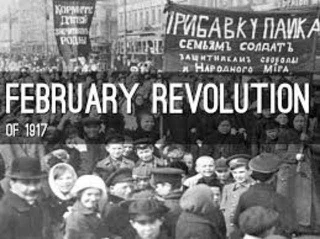 The February Revolution begins with strikes, demonstrations, and mutinies in Petrograd