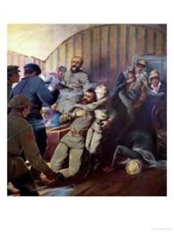Czar Nicholas II and his family are executed