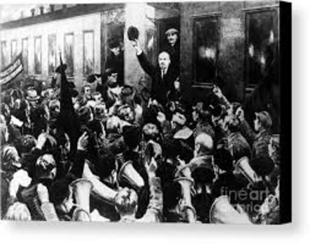 Lenin returns from exile and arrives in Petrograd via a sealed train