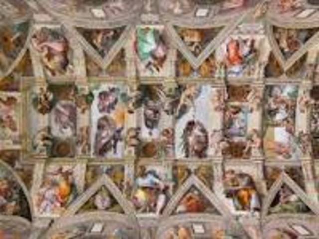 Michelangelo paints the frescoes in the Sistine Chapel