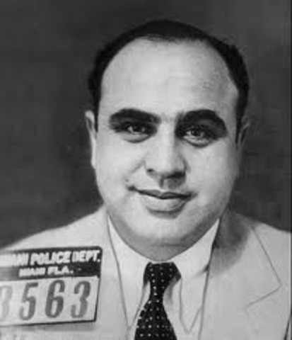 Al Capone is arrested for tax evasion