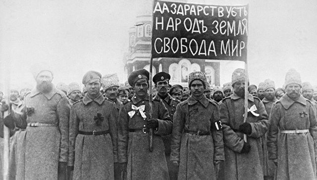 The February Revolution begins with strikes, demonstrations, and mutinies in Petrograd
