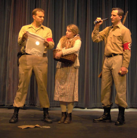 Annemarie runs the package to Uncle Henrik