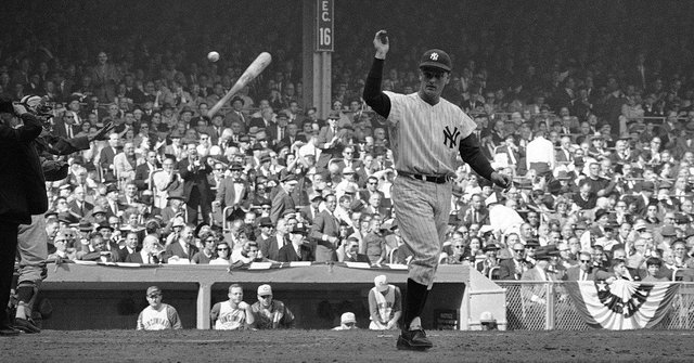 Roger Maris of the Yankees breaks Babe Ruth's single season home run record