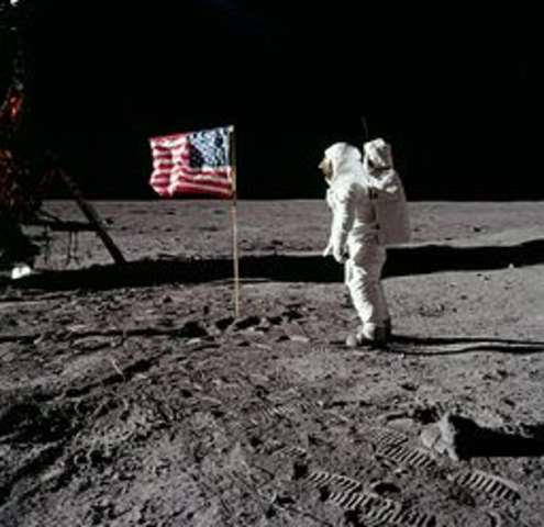 Neil Armstrong lands on the moon