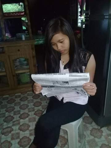 Reading Newspaper