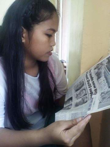 Reading Newspaper