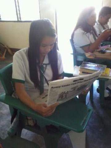 Reading Newspaper