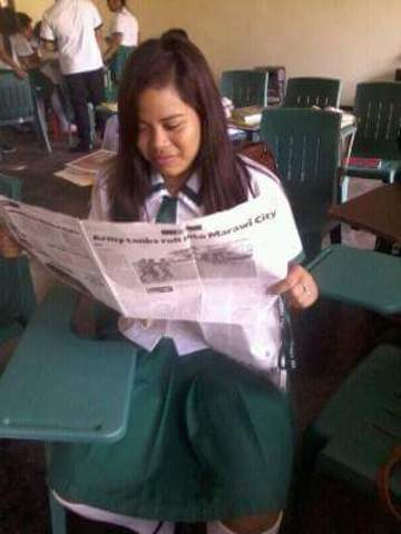 Reading Newspaper