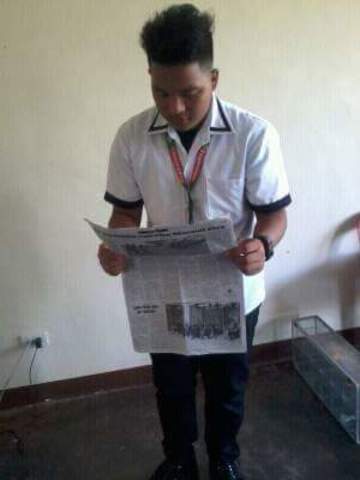 Reading Newspaper