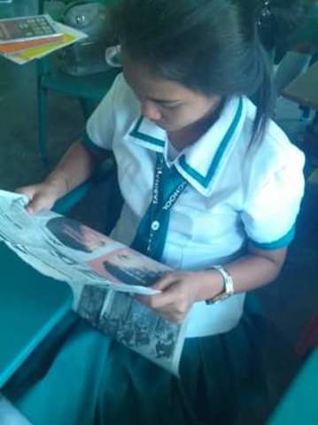 Reading Newspaper