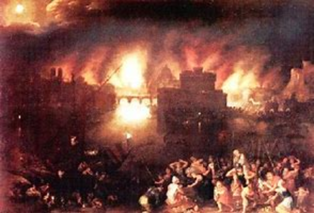 The Greek army destroys Troy.