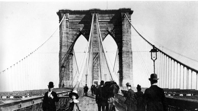 The Brooklyn Bridge opens.
