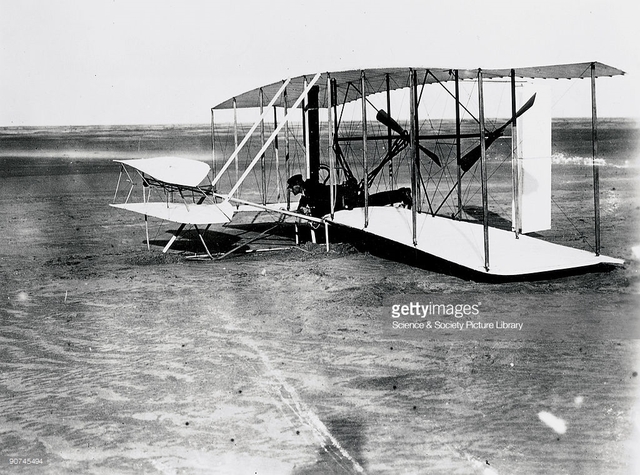Orville Wright makes the first powered airplane flight.