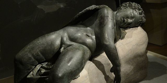 Bronze statue of Eros sleeping