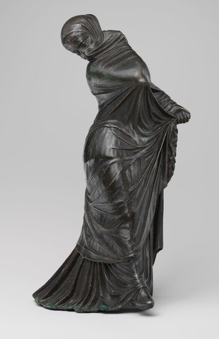 Bronze statuette of a veiled and masked dancer