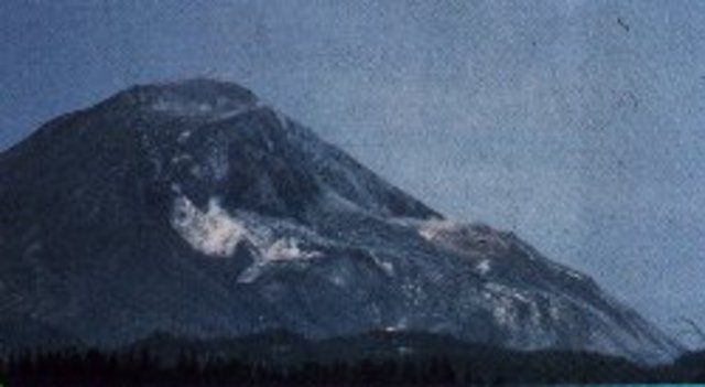 Small explosions of steam and ash are emitted from the volcano.