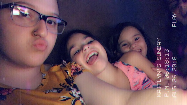 Reading to my cousins.