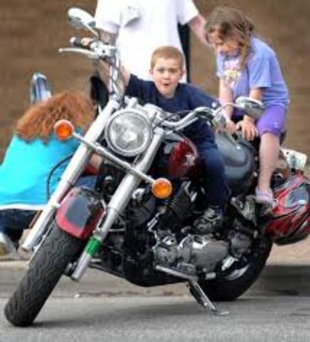 Sat on a parked motorcycle