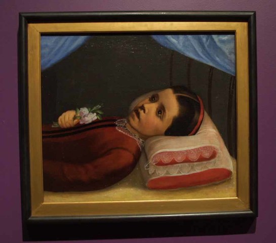 Aparición del retrato del niño muerto