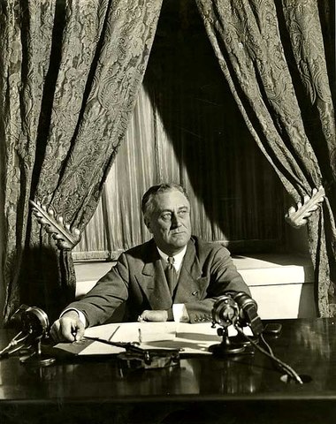 FDR Broadcasts the First "Fireside Chat"