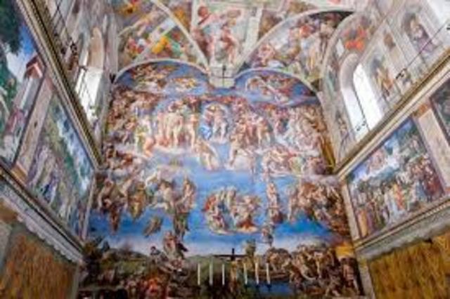 Michelangelo begins painting the Sistine Chapel