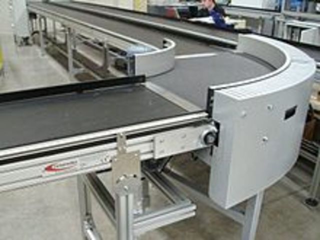 FORD FUE EL PRIMERO EN ESTABLECER LA BANDA TRANSPORTADORA