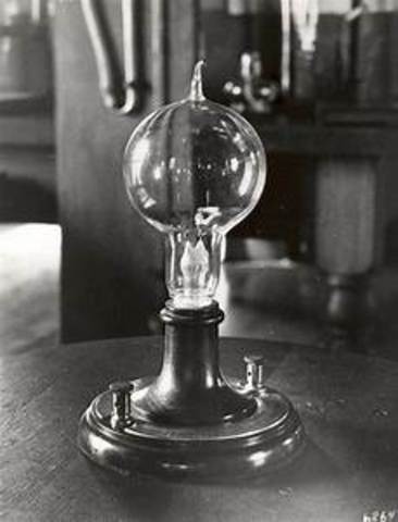 Thomas Edison invents the lightbulb