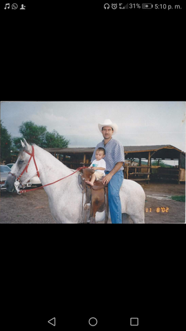 Mi papa y yo en el caballo
