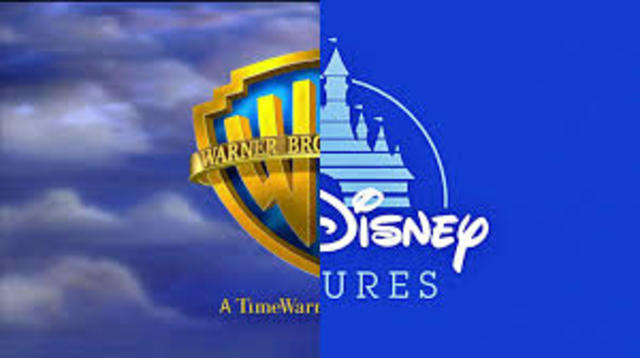 major difference between walt Disney and Warner brothers