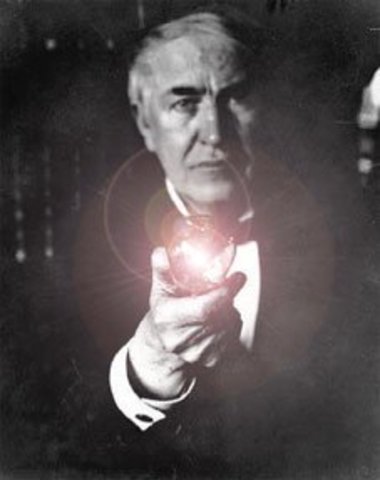 Edison perfects the incandescent light bulb