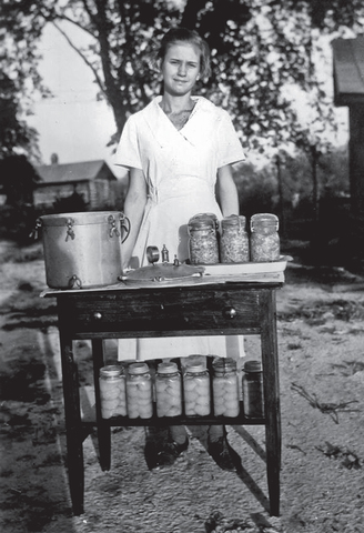 The first girls’ tomato club (4-H) organized by Marie Cromer a teacher, through Agricultural Extension. She organized them after learning of boys’ corn clubs.