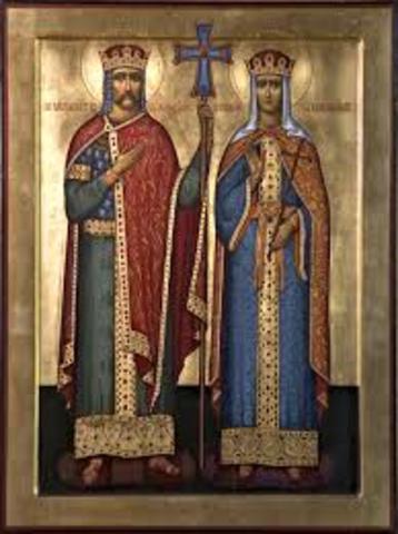 Olga of Russia converts to Christianity