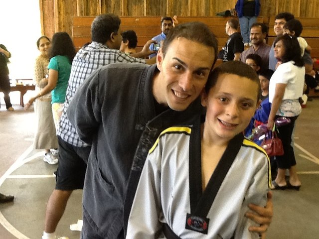 Receiving my 2nd Degree Black Belt