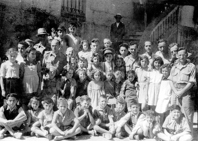 Misha meets Dr. Korczak and the orphans
