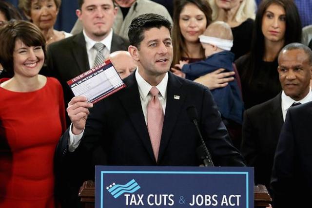 Tax Cuts and Jobs Act is signed into law