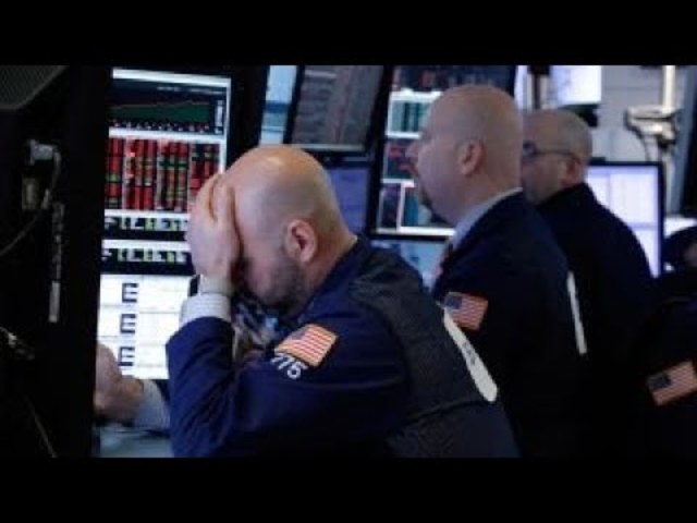 The Dow Jones Industrial Average closes at 6594.44