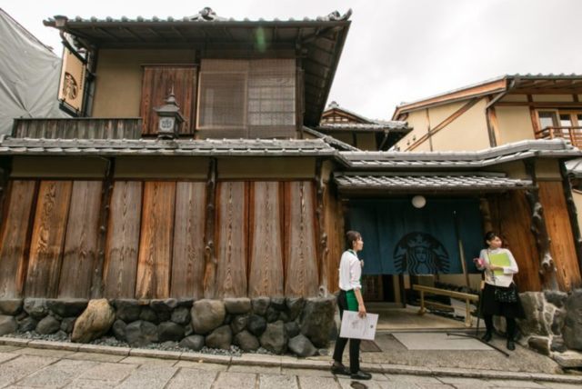 Opens stores in Japan - 1996