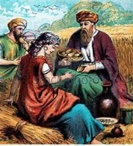 Boaz feeds Ruth