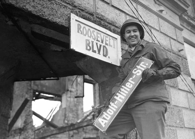 *'Denazification' Begins