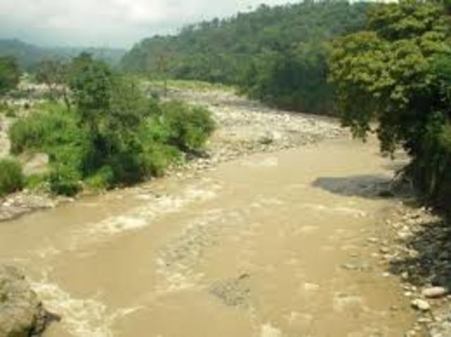 Nearby Coatan River began to rise and engulfed the settlement.
