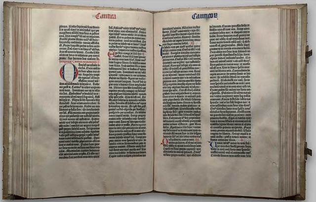 Gutenberg prints bible using movable type