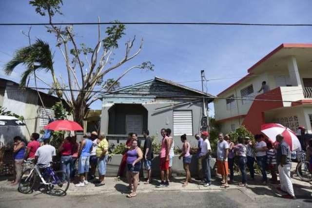 Lines of residents waiting for supplies
