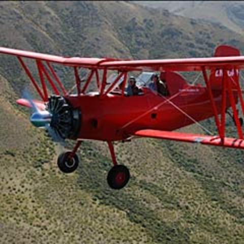 MPs have their international travel perk stripped, replaced by a new scheme.