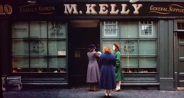 Eilis begins working at Miss Kelly's shop