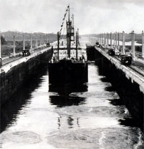 The Panama Canal is completed and opened for traffic