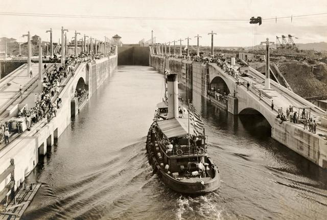 The Panama Canal is completed and opened for traffic
