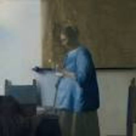 De brieflezende vrouw in het blauw