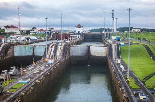 The Panama Canal is completed and opened for traffic